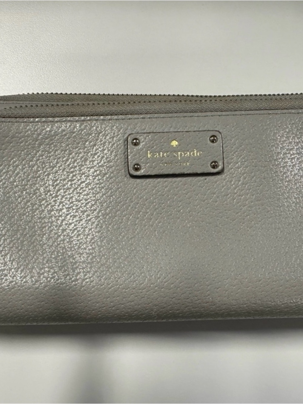 Kate Spade Gray pebbled leather zip wallet